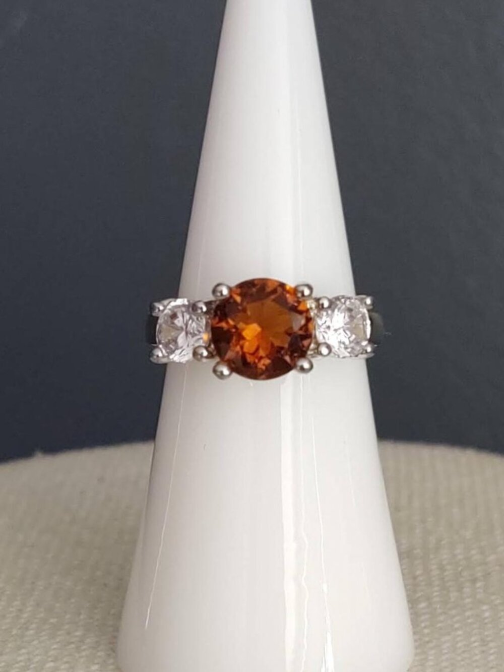 3 stone cognac and clear stone ring